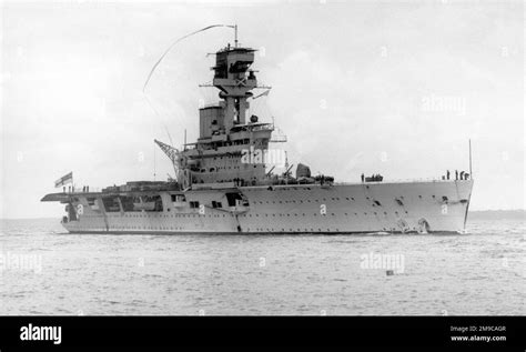 boat docked in front of hermes|HMS Hermes; the first aircraft carrier .